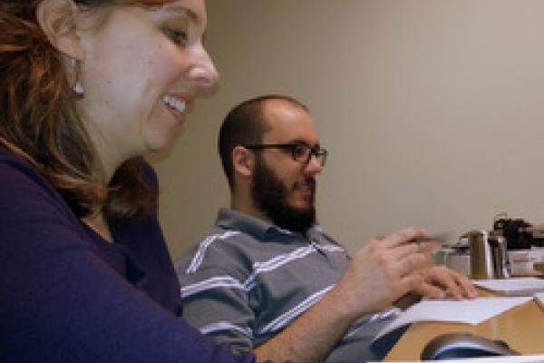 Eva Dale and Dustin Perzanowski working on ASC Drupal Eva Dale and Dustin Perzanowski in front of computer