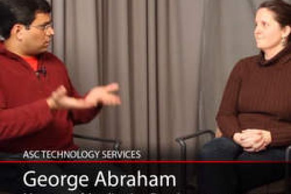 Still image from ASCTech video showing George Abraham talking to Jen Belisle