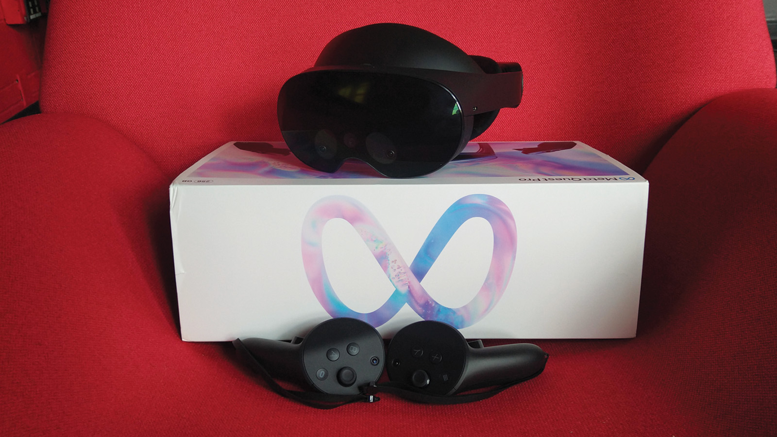 Meta Quest Pro VR headset displayed with packaging and a pair of hand controllers