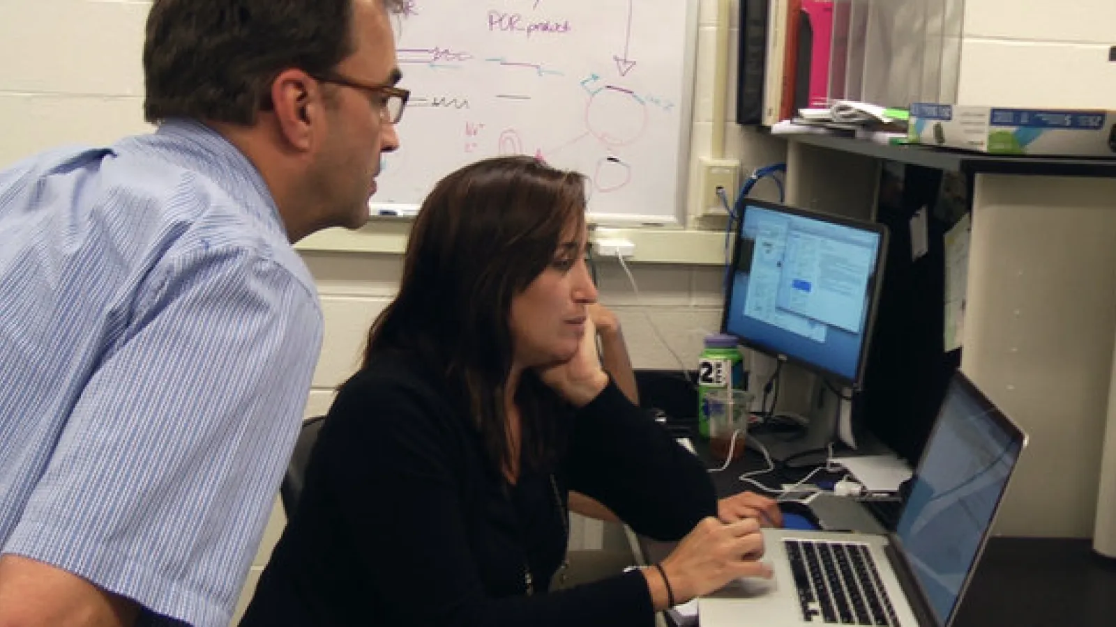 Kelly Wrighton (right) with Sandy Shew in the Wrighton Laboratory 