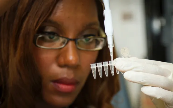 Woman pipetting