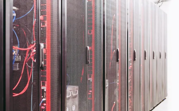 Servers stacked side-by-side in a room