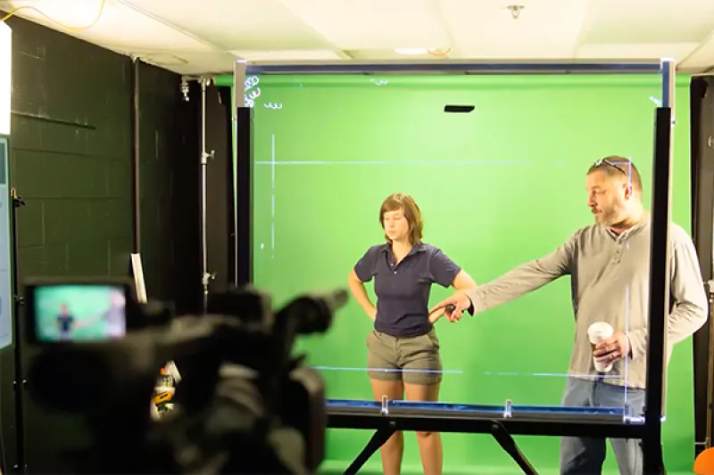 Work instructing teacher for green screen video