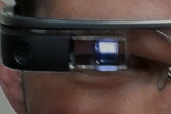 Extreme closeup of Google Glass wearer